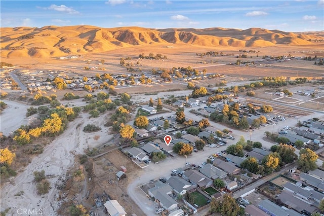 bird's eye view featuring a residential view and a mountain view