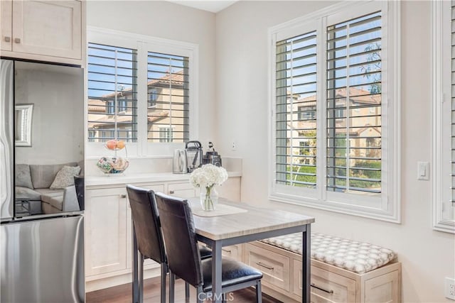 dining space featuring wood finished floors