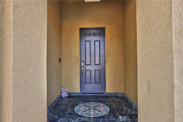 23531 Hobart Ct, Murrieta, CA 92562 - entrance to property featuring stucco siding