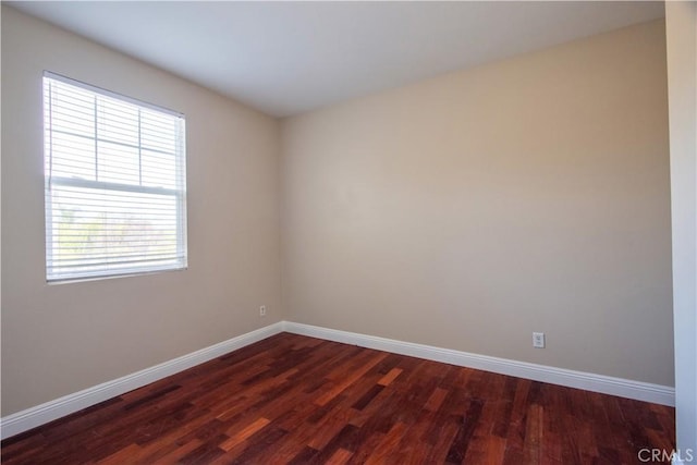 23531 Hobart Ct, Murrieta, CA 92562 - empty room featuring dark wood-style flooring and baseboards