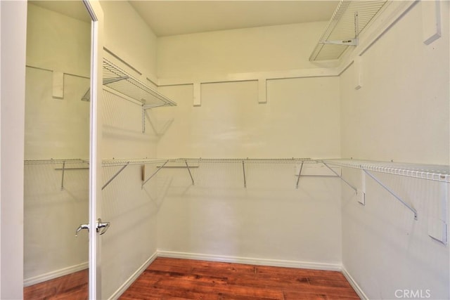 23531 Hobart Ct, Murrieta, CA 92562 - spacious closet featuring wood finished floors