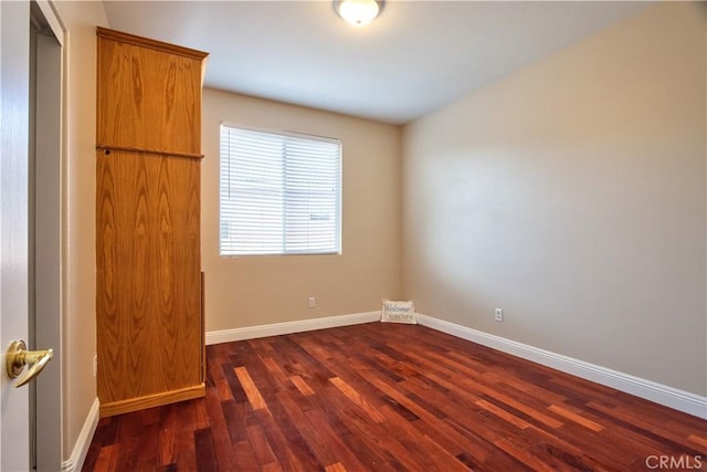 23531 Hobart Ct, Murrieta, CA 92562 - unfurnished bedroom featuring dark wood-style floors and baseboards