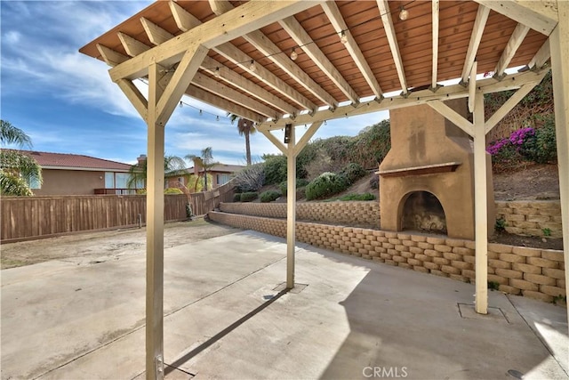 23531 Hobart Ct, Murrieta, CA 92562 - view of patio with an outdoor brick fireplace