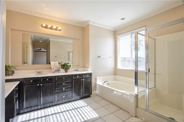 23531 Hobart Ct, Murrieta, CA 92562 - bathroom featuring a garden tub, a shower stall, tile patterned flooring, double vanity, and ornamental molding