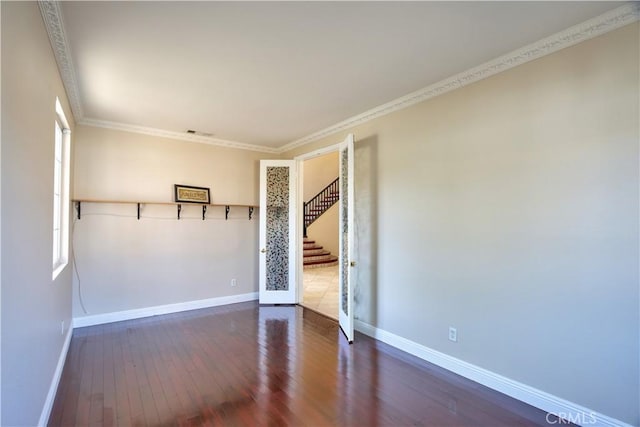 23531 Hobart Ct, Murrieta, CA 92562 - unfurnished room featuring hardwood / wood-style floors, stairs, and ornamental molding
