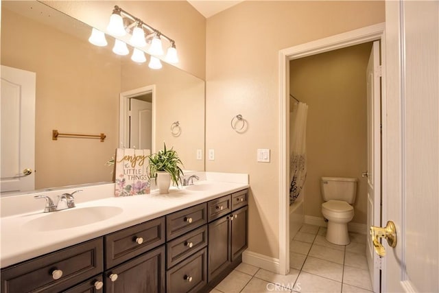23531 Hobart Ct, Murrieta, CA 92562 - bathroom featuring tile patterned flooring, double vanity, toilet, shower / bath combo, and baseboards