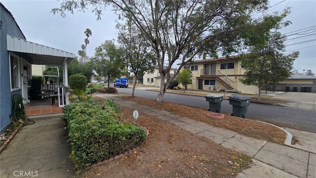 view of street featuring curbs and sidewalks