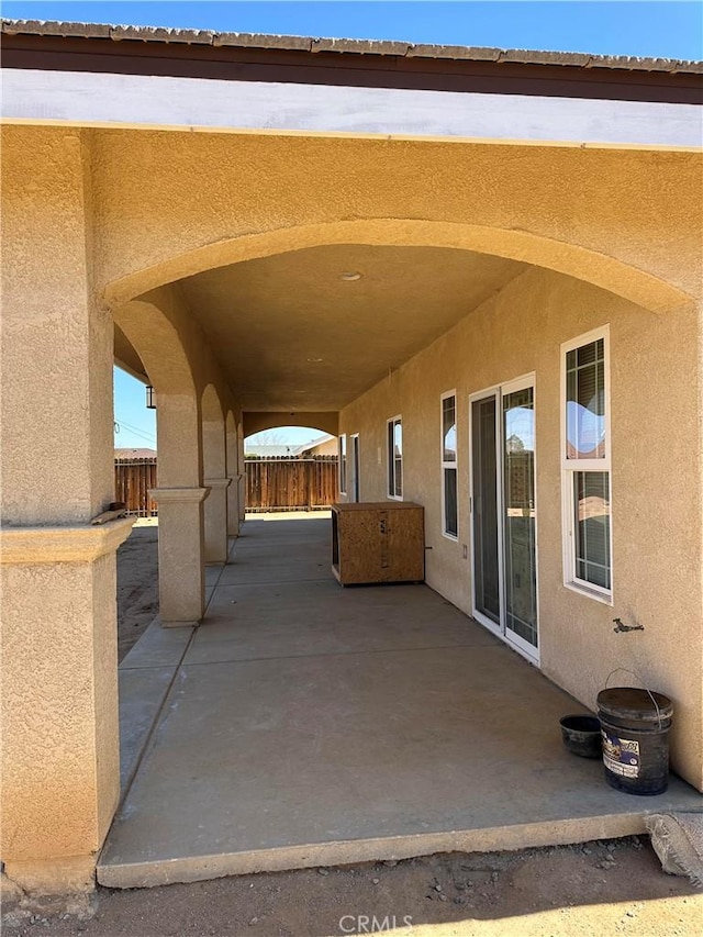 view of patio with fence