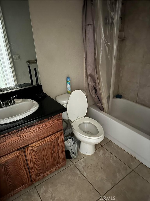 full bathroom with shower / bath combo, vanity, toilet, and tile patterned floors