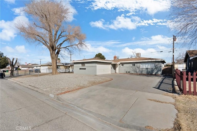 view of front of property featuring fence