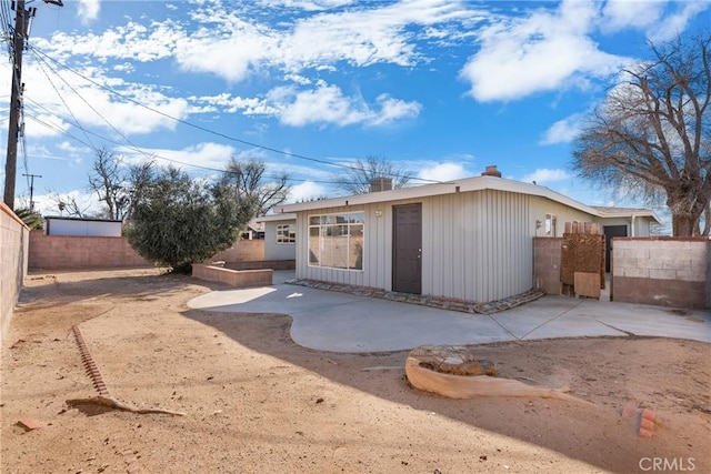 view of outdoor structure with a fenced backyard