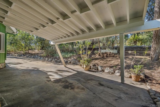 view of patio / terrace featuring fence