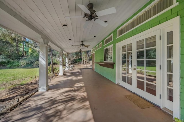 view of patio featuring french doors and a ceiling fan