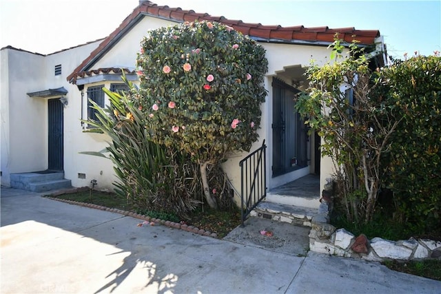 exterior space with stucco siding