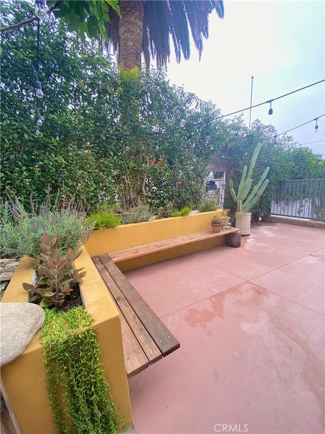 view of patio with fence