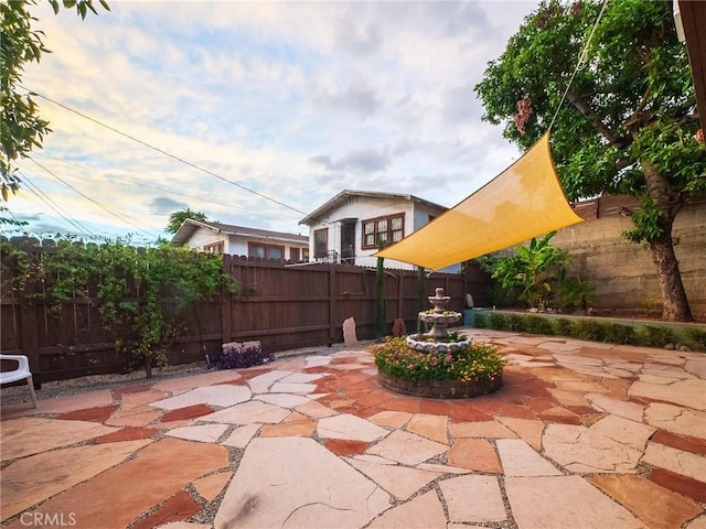 view of patio with a fenced backyard