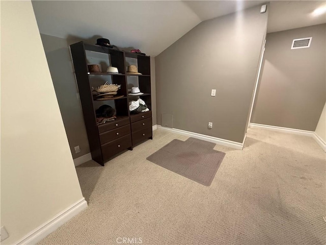 7122 Bluesails Dr, Huntington Beach, CA 92647 - interior space with lofted ceiling, light colored carpet, visible vents, and baseboards