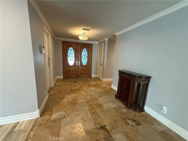 7122 Bluesails Dr, Huntington Beach, CA 92647 - foyer entrance featuring baseboards, visible vents, stone finish flooring, and ornamental molding