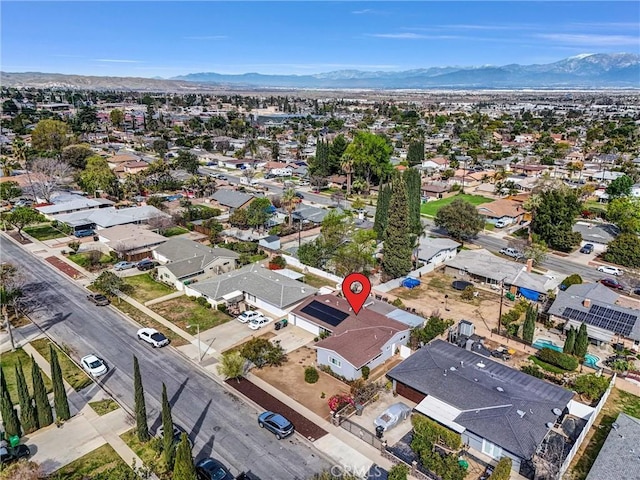 bird's eye view featuring a residential view and a mountain view