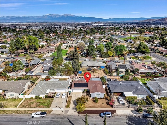 birds eye view of property featuring a residential view and a mountain view