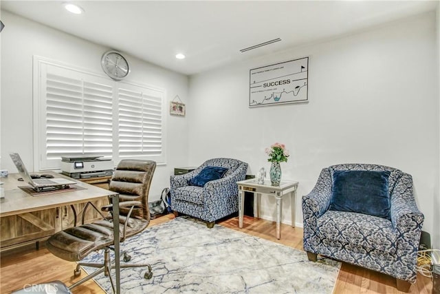 office space featuring visible vents, wood finished floors, and recessed lighting