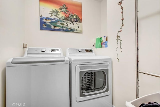 laundry area with laundry area and washer and dryer