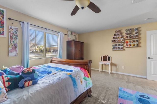 bedroom featuring ceiling fan, carpet flooring, and baseboards