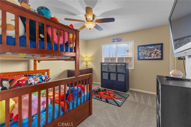 carpeted bedroom with baseboards