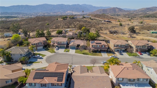 birds eye view of property with a residential view and a mountain view