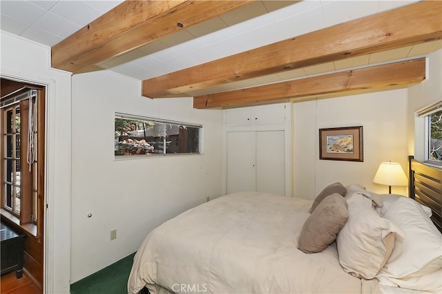 177 Joaquin Miller Rd, Lake Arrowhead, CA 92352 - bedroom featuring beamed ceiling and a closet