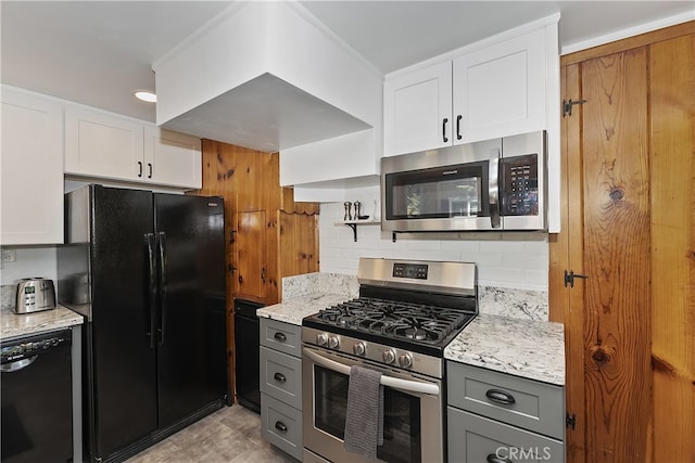 177 Joaquin Miller Rd, Lake Arrowhead, CA 92352 - kitchen with black appliances, white cabinetry, gray cabinetry, and light stone countertops