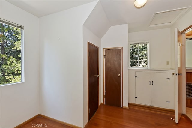 177 Joaquin Miller Rd, Lake Arrowhead, CA 92352 - hallway with plenty of natural light, wood finished floors, and attic access