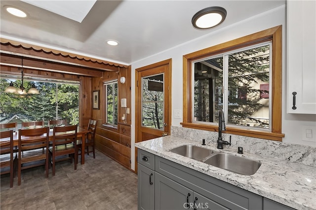 177 Joaquin Miller Rd, Lake Arrowhead, CA 92352 - kitchen featuring a sink, gray cabinetry, light stone counters, pendant lighting, and recessed lighting