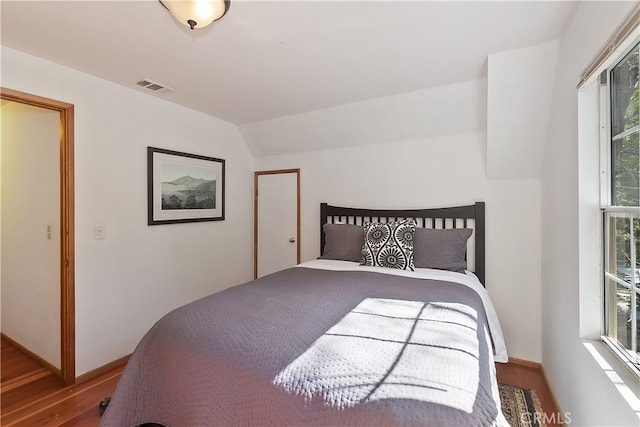 177 Joaquin Miller Rd, Lake Arrowhead, CA 92352 - bedroom featuring wood finished floors, lofted ceiling, and baseboards