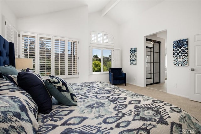 bedroom featuring baseboards, high vaulted ceiling, beam ceiling, and light colored carpet