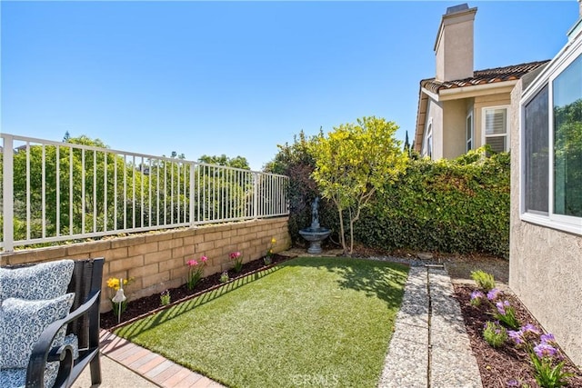 view of yard featuring a fenced backyard