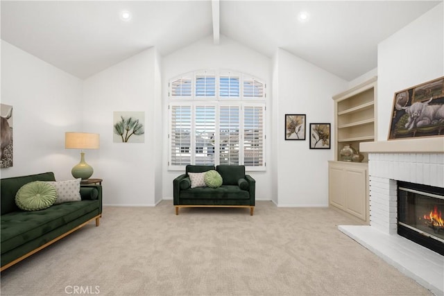 living area featuring lofted ceiling with beams, a fireplace, light carpet, and baseboards