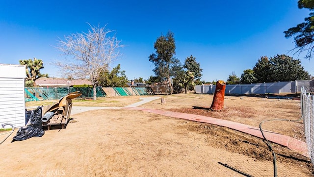 view of yard with fence