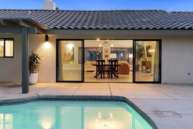 outdoor pool with a patio