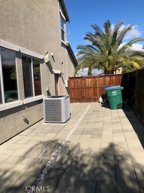14510 Spyglass Cir, Chowchilla, CA 93610 - view of patio / terrace featuring central air condition unit
