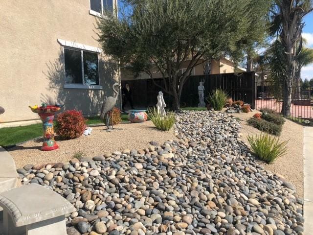 view of yard with fence