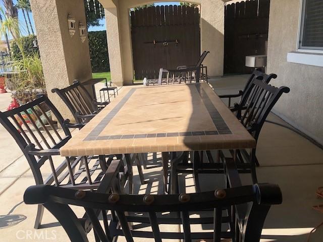 view of patio featuring outdoor dining area