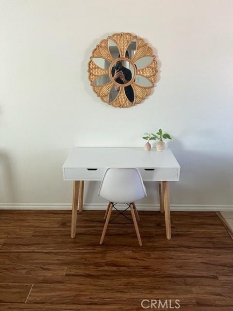 details with wood finished floors and baseboards