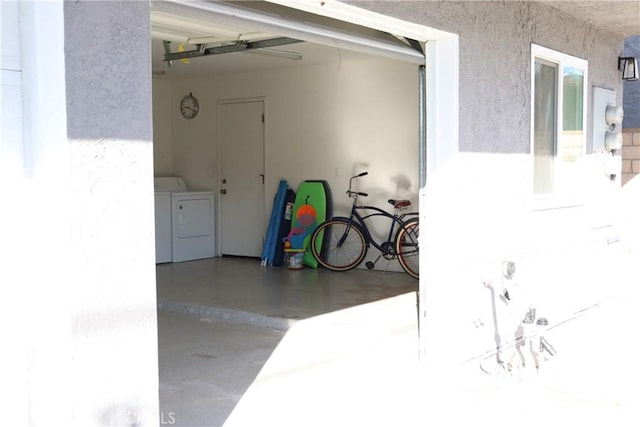 garage featuring independent washer and dryer