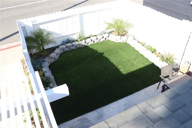 view of yard featuring a fenced backyard