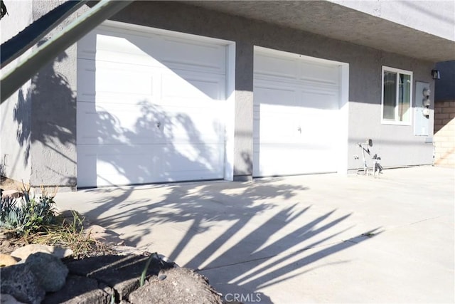 exterior space with stucco siding