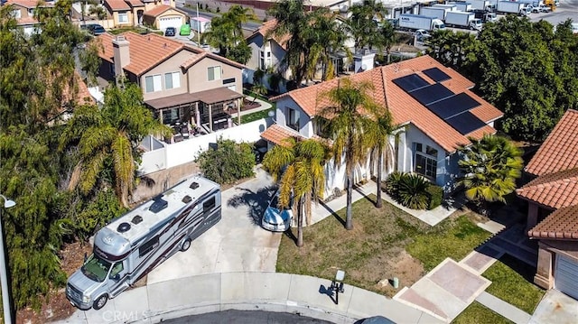 birds eye view of property with a residential view