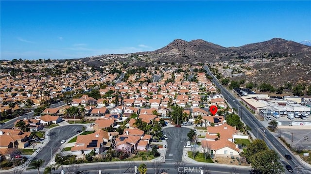 birds eye view of property with a residential view and a mountain view