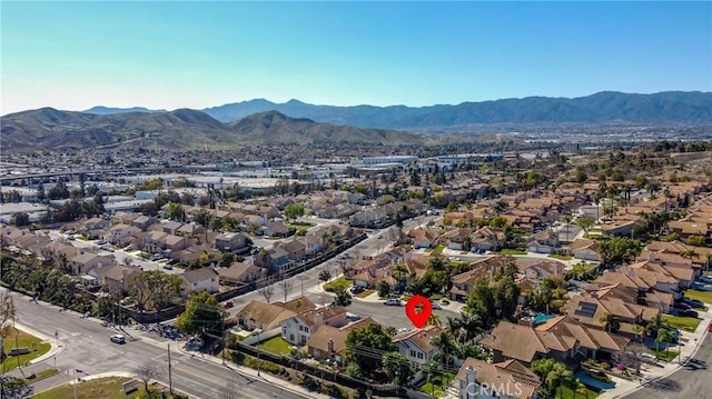 bird's eye view with a residential view and a mountain view