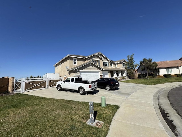 view of front facade with fence, concrete driveway, a residential view, a gate, and a front lawn